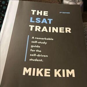 The LSAT Trainer by - Black and Blue Cover
